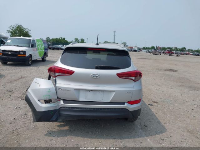 KM8J3CA40GU074189 Hyundai TUCSON SE
