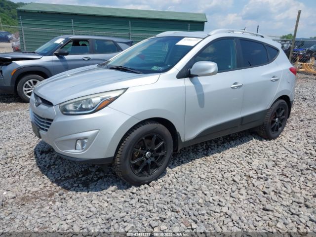 KM8JUCAG3EU869371 Hyundai TUCSON SE