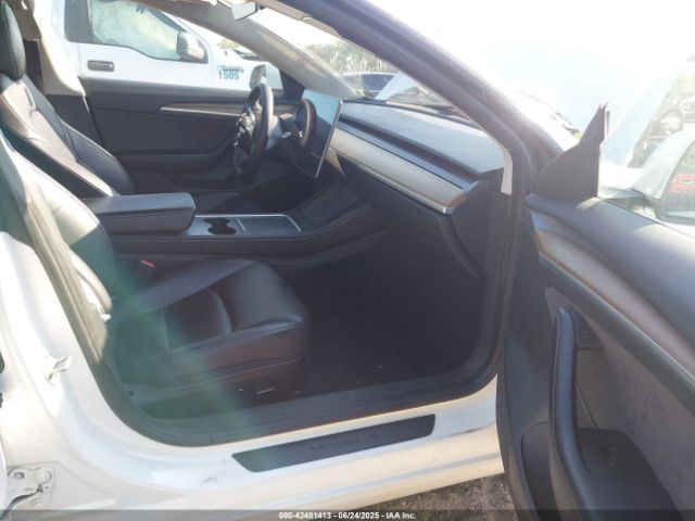 2023 TESLA MODEL 3 5YJ3E1EA9PF557880 Photo 4