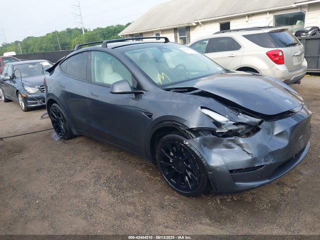 2023 TESLA MODEL Y 7SAYGDEE3PF631527 Photo 0