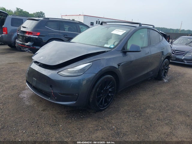 2023 TESLA MODEL Y 7SAYGDEE3PF631527 Photo 1