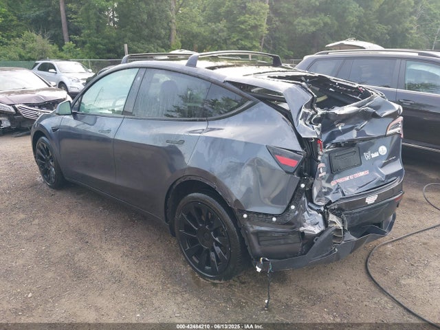 2023 TESLA MODEL Y 7SAYGDEE3PF631527 Photo 2
