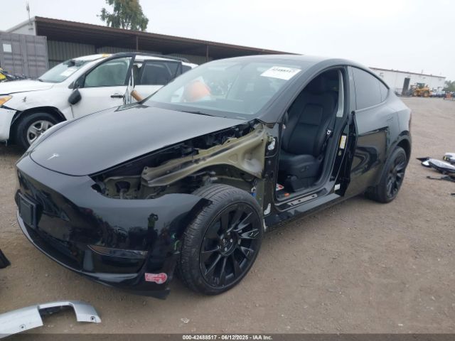 2024 TESLA MODEL Y 7SAYGDEE7RA236864 Photo 1