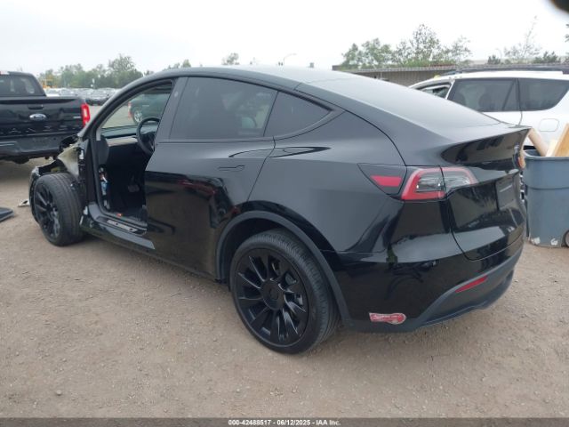 2024 TESLA MODEL Y 7SAYGDEE7RA236864 Photo 2