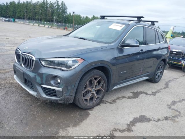 2017 BMW X1 WBXHT3C39H5F73601 Photo 1