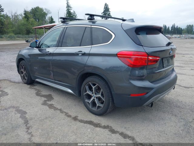 2017 BMW X1 WBXHT3C39H5F73601 Photo 2