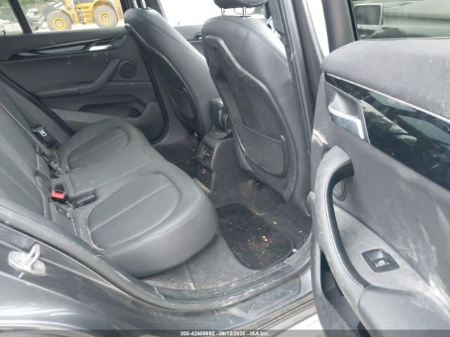 2017 BMW X1 WBXHT3C39H5F73601 Photo 7
