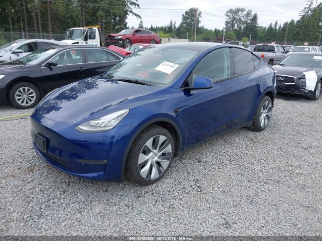 2022 TESLA MODEL Y 7SAYGDEEXNF409340 Photo 1