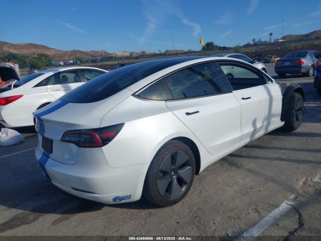 5YJ3E1EA3MF923537 Tesla 2021