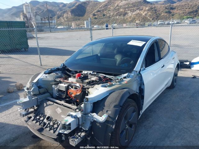 5YJ3E1EA3MF923537 Tesla 2021