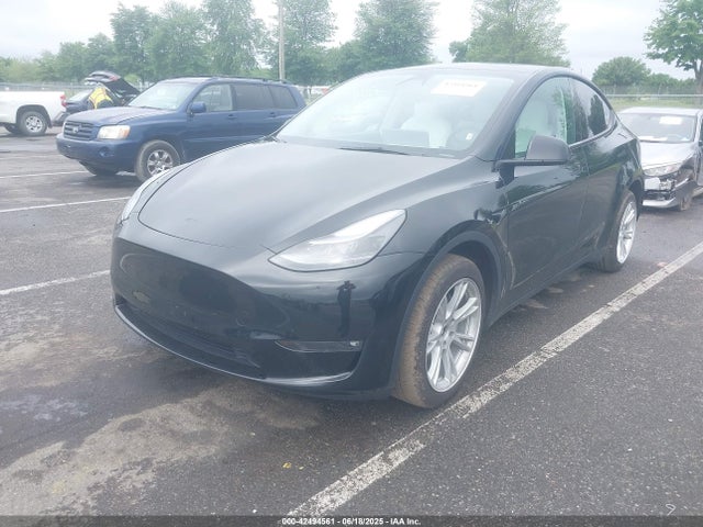 2023 TESLA MODEL Y 7SAYGDEE8PF796571 Photo 1