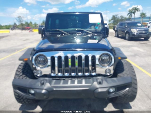 1C4BJWDG4GL327638 Jeep Wrangler Unlimited Sport