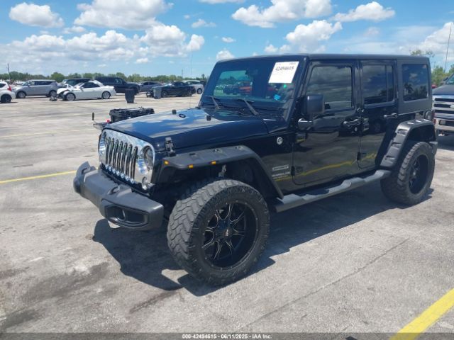 1C4BJWDG4GL327638 Jeep Wrangler Unlimited Sport