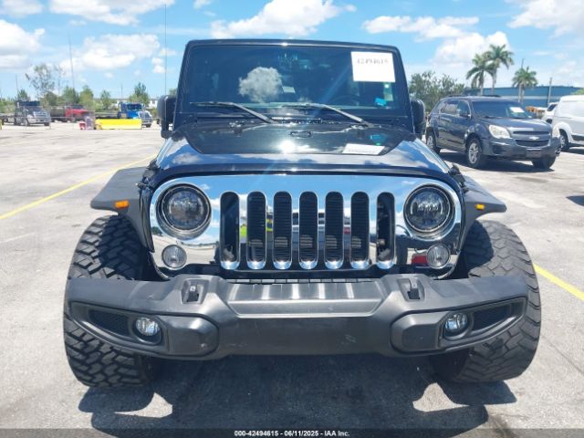 1C4BJWDG4GL327638 Jeep Wrangler Unlimited Sport