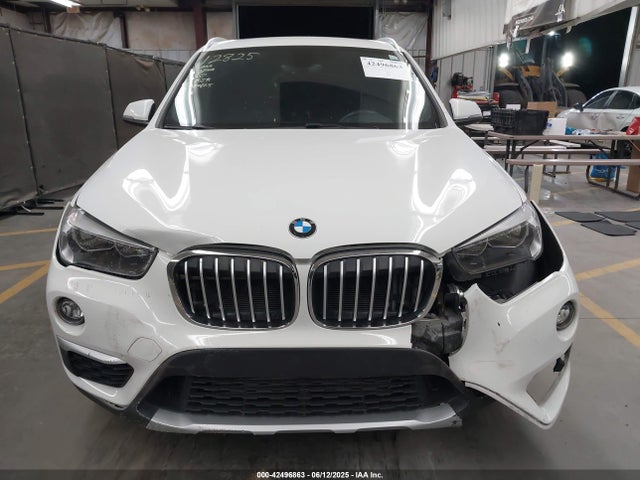 WBXHU7C38J5L06893 BMW X1