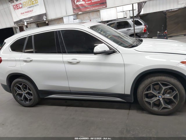 WBXHU7C38J5L06893 BMW X1