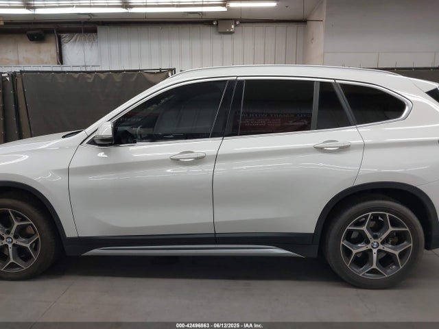 WBXHU7C38J5L06893 BMW X1