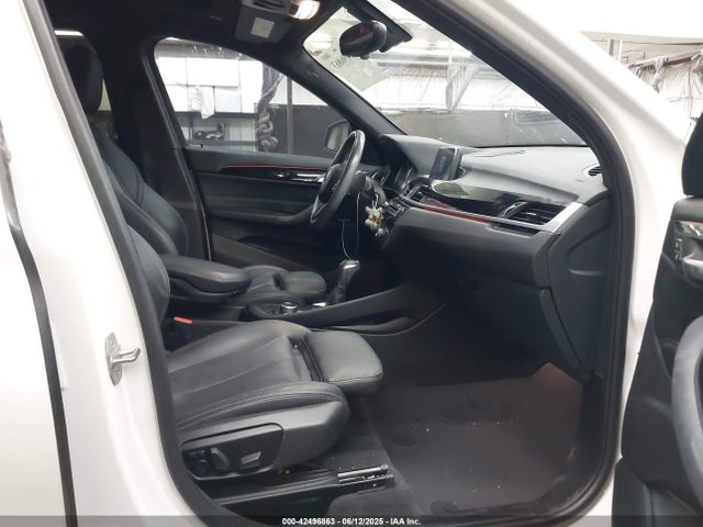 WBXHU7C38J5L06893 BMW X1