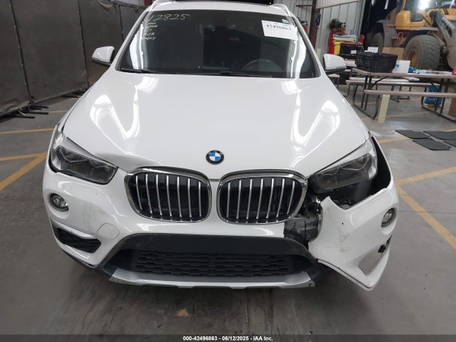 WBXHU7C38J5L06893 BMW X1