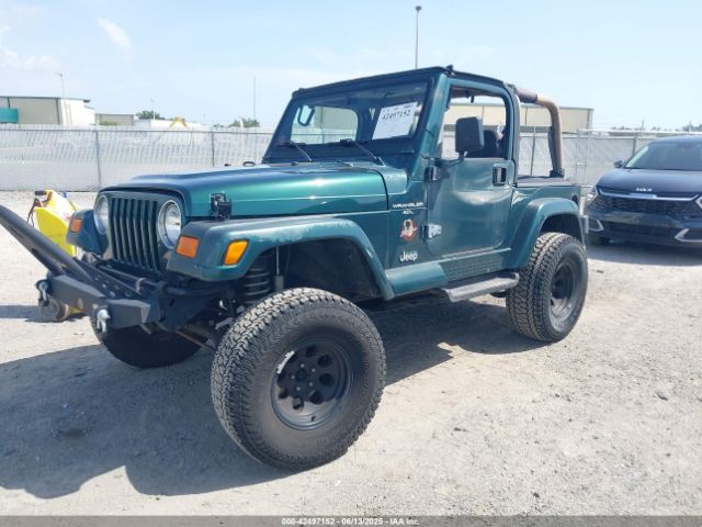 2000 JEEP WRANGLER 1J4FA59S4YP805067 Photo 1