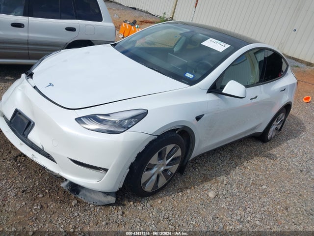 2023 TESLA MODEL Y 7SAYGDEE9PA060896 Photo 1