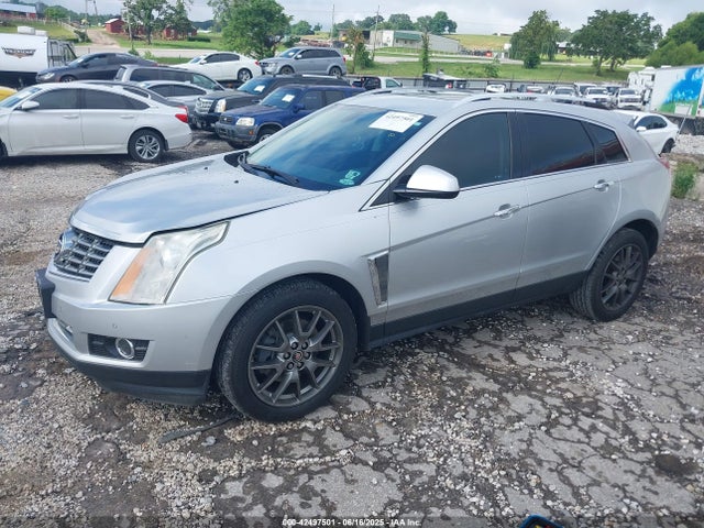 2016 CADILLAC SRX 3GYFNCE30GS563479 Photo 1