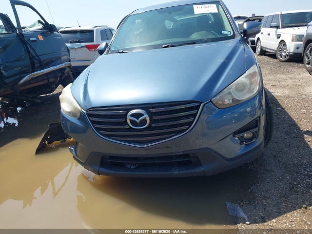 JM3KE2CY5G0792543 Mazda py