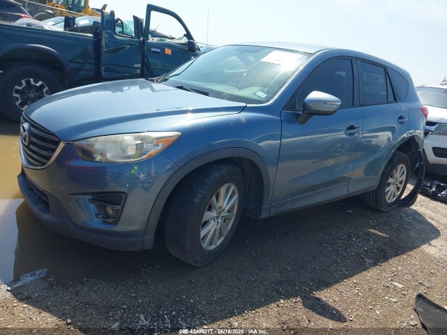 JM3KE2CY5G0792543 Mazda py