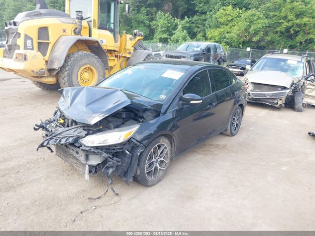 2017 FORD FOCUS 1FADP3H28HL289729 Photo 1