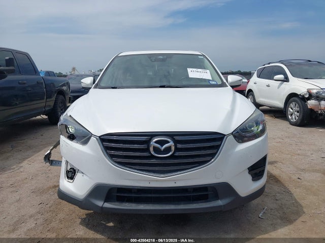JM3KE4DY7G0861632 Mazda py