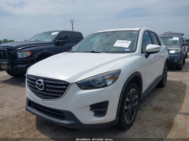 JM3KE4DY7G0861632 Mazda py