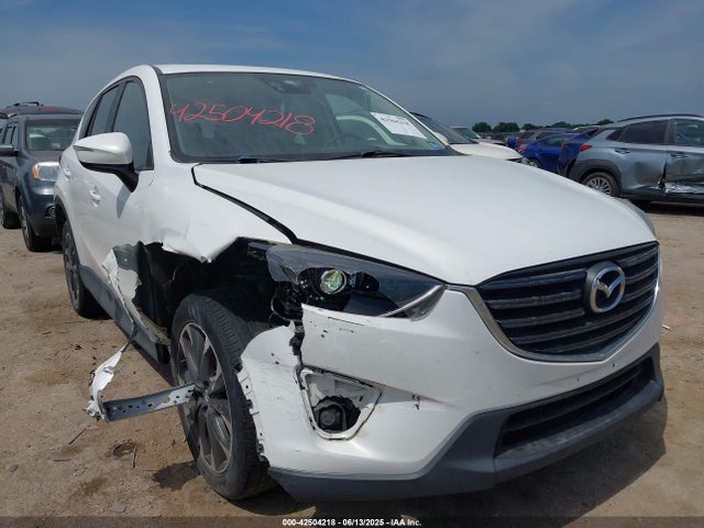JM3KE4DY7G0861632 Mazda py