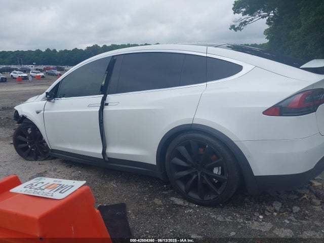 5YJXCAE28GF003990 Tesla 2016