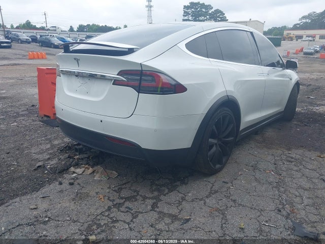 5YJXCAE28GF003990 Tesla 2016