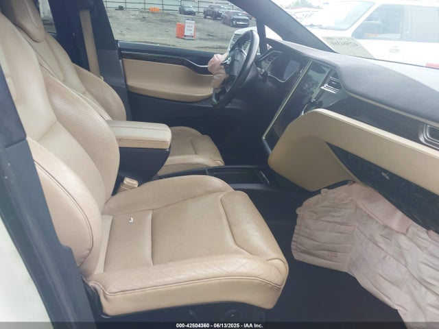 5YJXCAE28GF003990 Tesla 2016