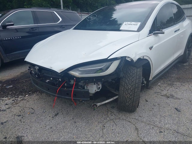 5YJXCAE28GF003990 Tesla 2016