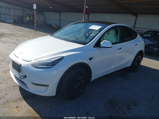 2024 TESLA MODEL Y 7SAYGDEE8RF983795 Photo 1