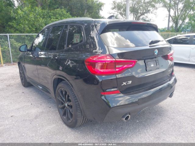 2019 BMW X3 5UXTR7C54KLF33863 Photo 2