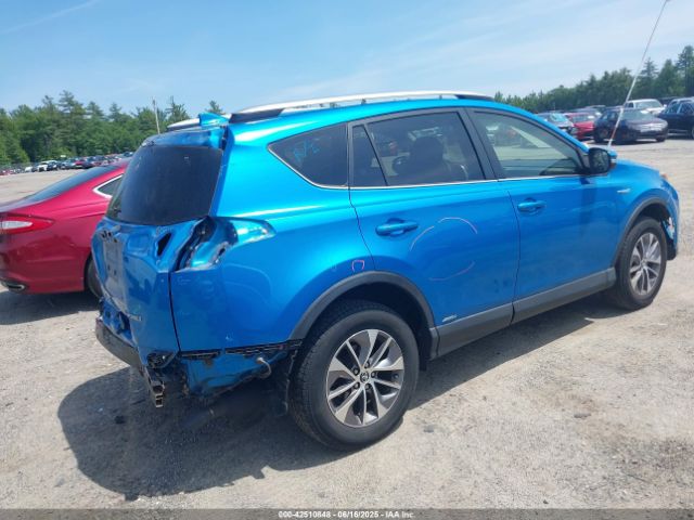 2018 TOYOTA RAV4 HYBRID JTMRJREV6JD252410 Photo 3