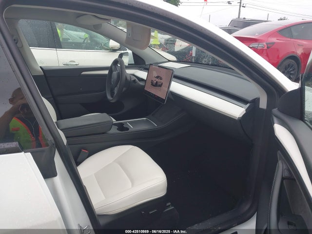 2023 TESLA MODEL Y 7SAYGDEE7PF754571 Photo 4