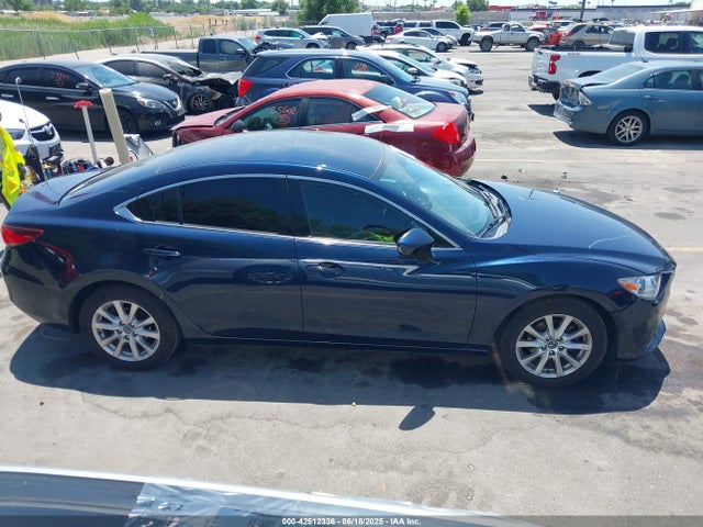 JM1GJ1U54G1435793 Mazda py