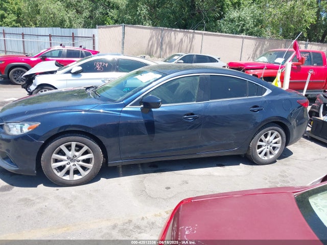 JM1GJ1U54G1435793 Mazda py