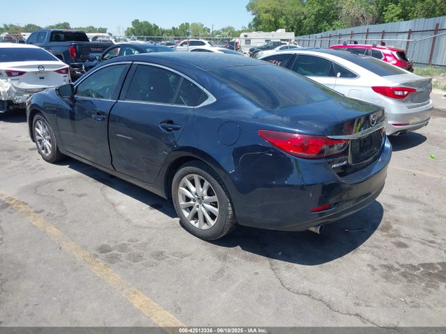 JM1GJ1U54G1435793 Mazda py