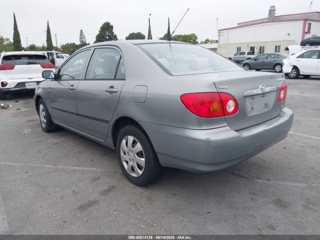 2004 TOYOTA COROLLA 1NXBR32E94Z210597 Photo 2