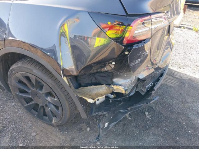 2024 TESLA MODEL Y 7SAYGDED8RF158878 Photo 5