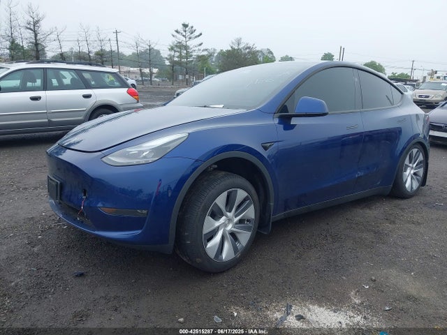 2024 TESLA MODEL Y 7SAYGDEE2RA287463 Photo 1