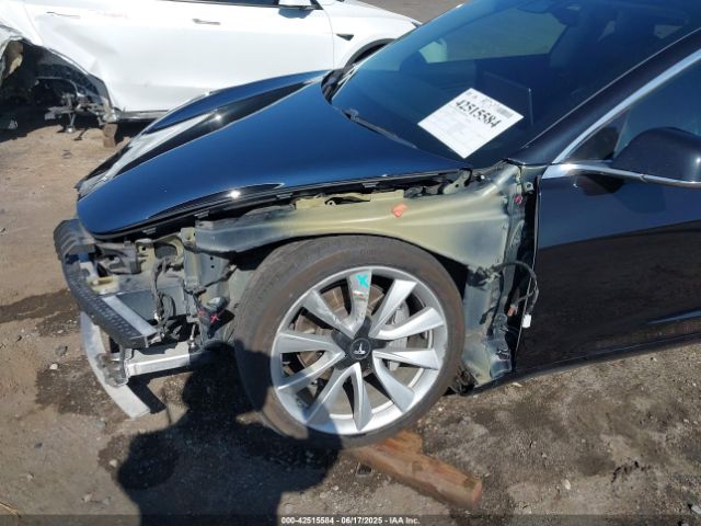 5YJ3E1EA9JF071237 Tesla 2018