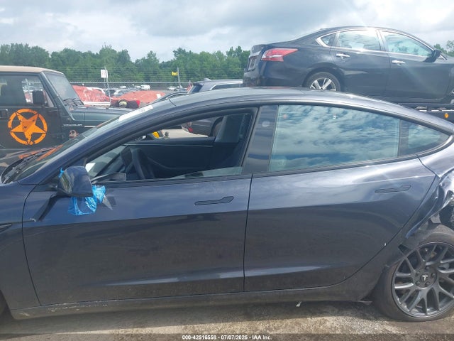 5YJ3E1EB4RF834513 Tesla 2024