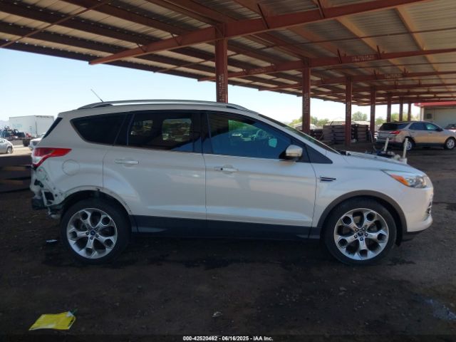 1FMCU0J99EUA63222 Ford 2014