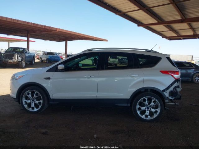 1FMCU0J99EUA63222 Ford 2014